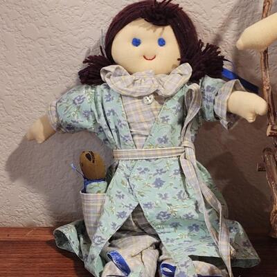 Lot 273: Cornelloki Dolls and Wood Chair