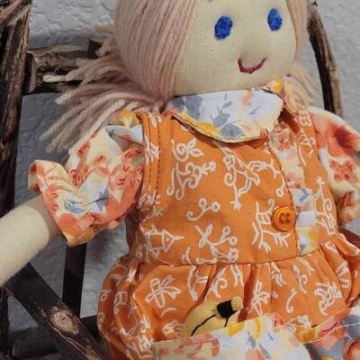 Lot 273: Cornelloki Dolls and Wood Chair