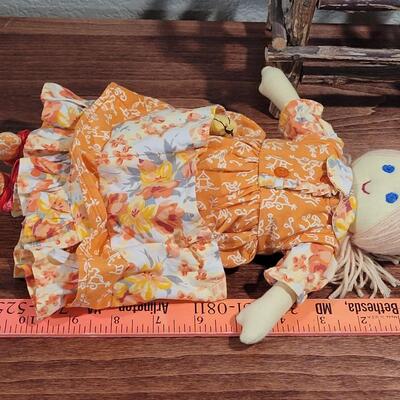 Lot 273: Cornelloki Dolls and Wood Chair