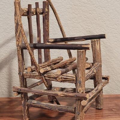 Lot 273: Cornelloki Dolls and Wood Chair