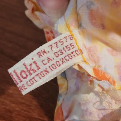 Lot 273: Cornelloki Dolls and Wood Chair