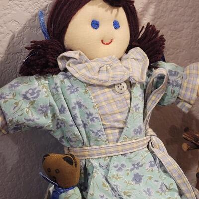 Lot 273: Cornelloki Dolls and Wood Chair