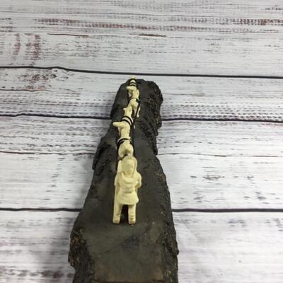 Eskimo sledding with dogs Figurine