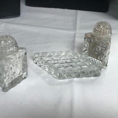 Cute glass salt and pepper shakers with tray