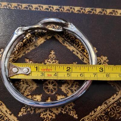 Lot 293: Silver Tone INFINITY Symbol Bracelet