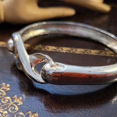 Lot 293: Silver Tone INFINITY Symbol Bracelet