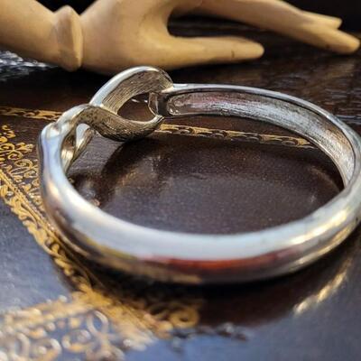 Lot 293: Silver Tone INFINITY Symbol Bracelet