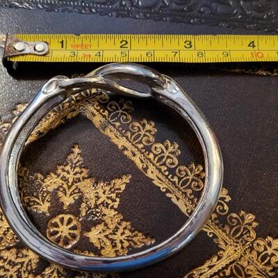 Lot 293: Silver Tone INFINITY Symbol Bracelet