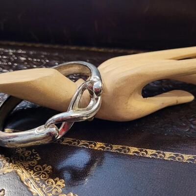 Lot 293: Silver Tone INFINITY Symbol Bracelet