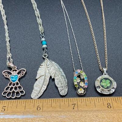 Set of 4 Silvertone Fashion Charm Pendant Necklaces