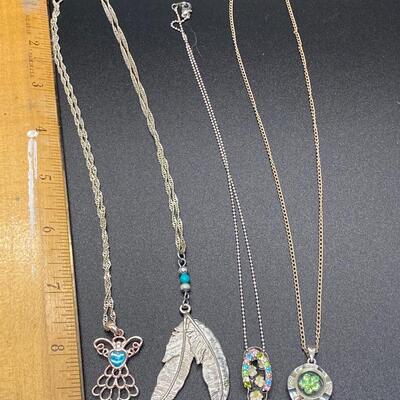 Set of 4 Silvertone Fashion Charm Pendant Necklaces