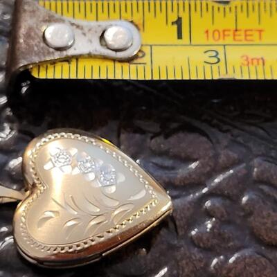 Lot 299: Vintage Gold Plated Lover's Locket and Necklace 