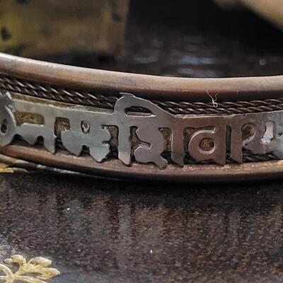 Lot 300: Vintage Copper Cuff Bracelet w/ Sanskrit 