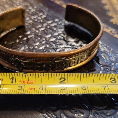 Lot 300: Vintage Copper Cuff Bracelet w/ Sanskrit 