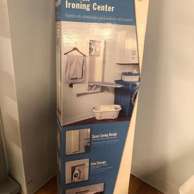 Hideaway in wall ironing center