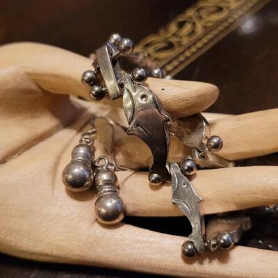 Lot 321: Vintage Sterling Silver Dolphin Bracelet + Sterling Drop Earrings