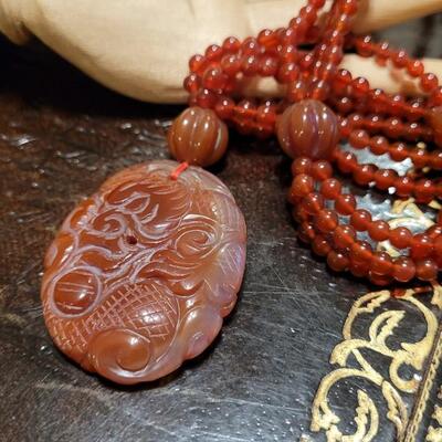 Lot 323: Vintage Asian CORNELIAN Bead Necklace with Matching Carved Dragon Pendant 
