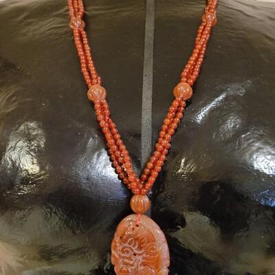 Lot 323: Vintage Asian CORNELIAN Bead Necklace with Matching Carved Dragon Pendant 