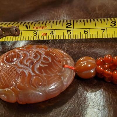 Lot 323: Vintage Asian CORNELIAN Bead Necklace with Matching Carved Dragon Pendant 