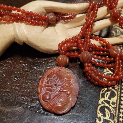 Lot 323: Vintage Asian CORNELIAN Bead Necklace with Matching Carved Dragon Pendant 