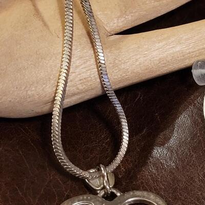 Lot 334: 21" GOD Pendant Necklace & 20" Writer Pendant Necklace 