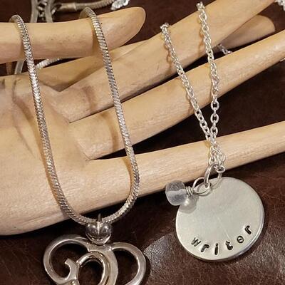 Lot 334: 21" GOD Pendant Necklace & 20" Writer Pendant Necklace 