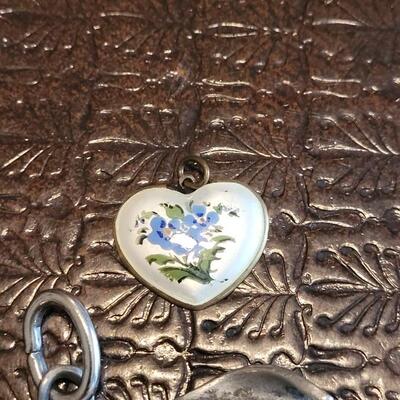 Lot 368: Dolphin and Handpainted Heart Pendants