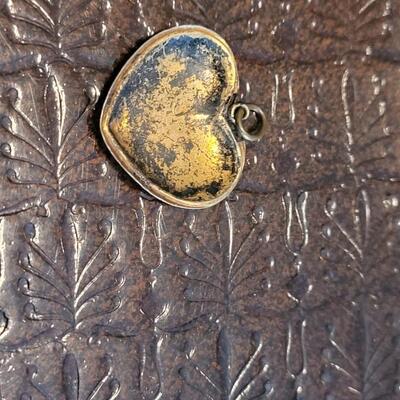 Lot 368: Dolphin and Handpainted Heart Pendants
