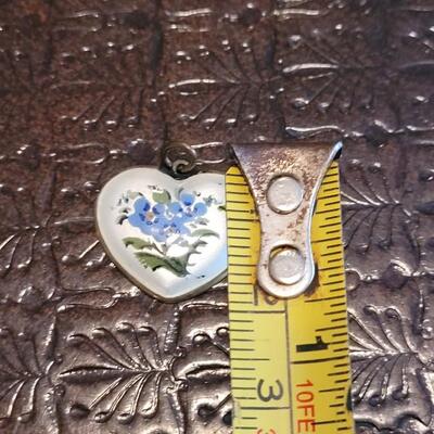 Lot 368: Dolphin and Handpainted Heart Pendants