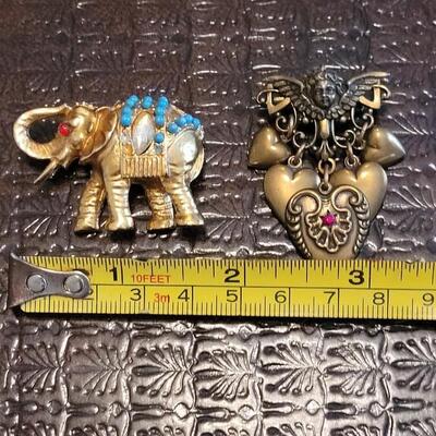 Lot 370: Elephant and Angel Heart Brooch