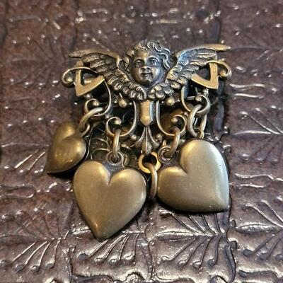 Lot 370: Elephant and Angel Heart Brooch