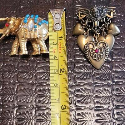Lot 370: Elephant and Angel Heart Brooch