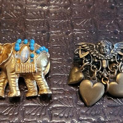 Lot 370: Elephant and Angel Heart Brooch