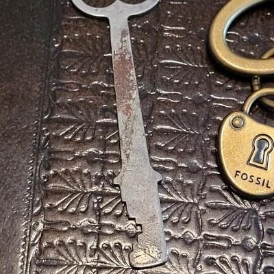 Lot 375: (2) Skelton Keys and a Fossil Skelton Keychain