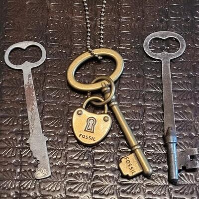 Lot 375: (2) Skelton Keys and a Fossil Skelton Keychain