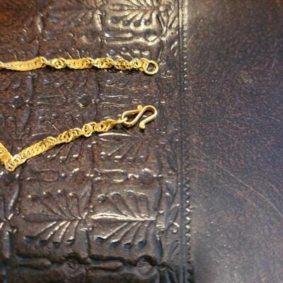 Lot 381: (2) Gold Tone Necklaces (long 38", short 17.5")