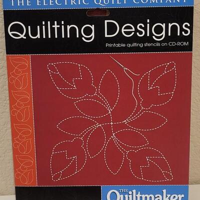 Lot 422: (2) Quilting University Notebooks and New Quilting Designs