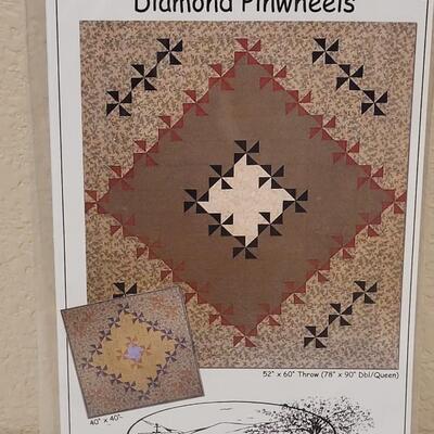 Lot 426: Quilting Patterns- one with Fabric cut outs
