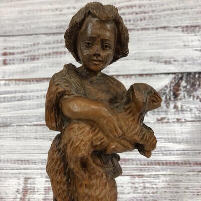 Boy and lamb wood carved figurine