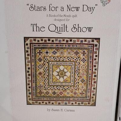 Lot 444: Stargazing Block of the Month Patterns in Binder and Stars of a New Day Block of the Month Club Patterns in Binder