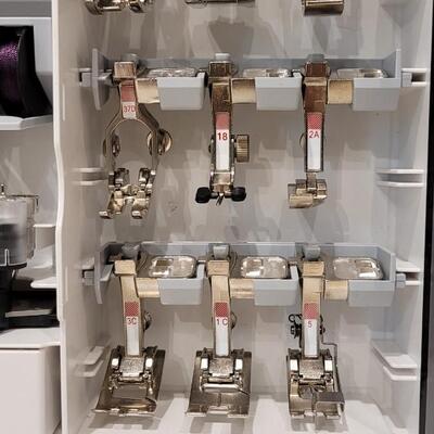 Lot 473: Bernina 830 with Feet, Hoops,  Presser Foot and More