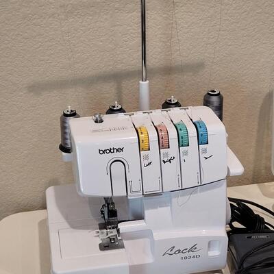 Lot 481: Brother Lock 1034D Overlock/Serger Machine with Box and Manual 
