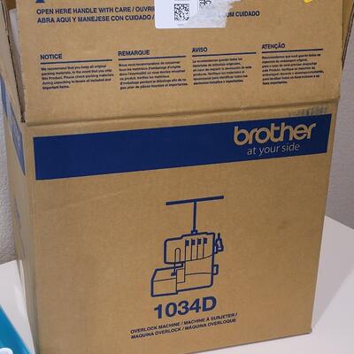 Lot 481: Brother Lock 1034D Overlock/Serger Machine with Box and Manual 