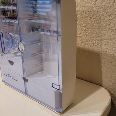 Lot 497: Bernina Thread and Feet Case with Bobbins