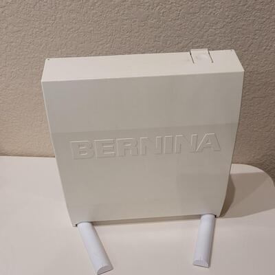 Lot 497: Bernina Thread and Feet Case with Bobbins