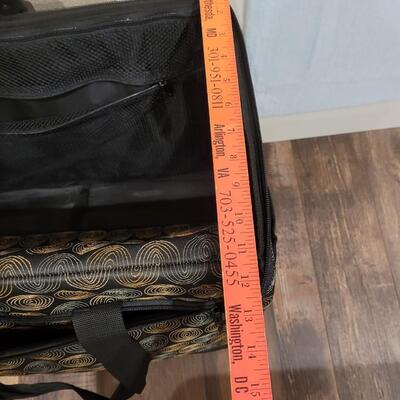 Lot 504: Sewing Machine Travel Case with Wheels and Telescope Handle