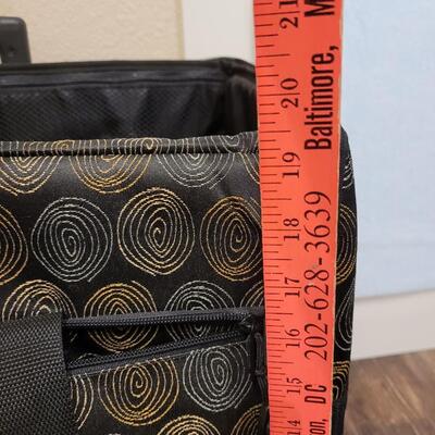 Lot 504: Sewing Machine Travel Case with Wheels and Telescope Handle