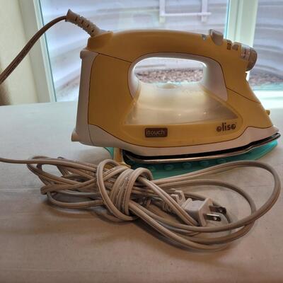 Lot 510: Oliso ittouch Iron and Ironing Rest Pad 