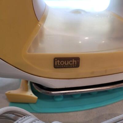 Lot 510: Oliso ittouch Iron and Ironing Rest Pad 