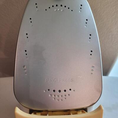 Lot 510: Oliso ittouch Iron and Ironing Rest Pad 